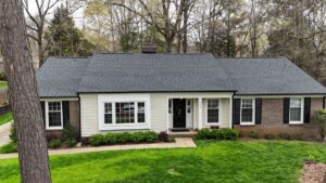 Rock roofing and restoration brick house white slides grey shingles roof