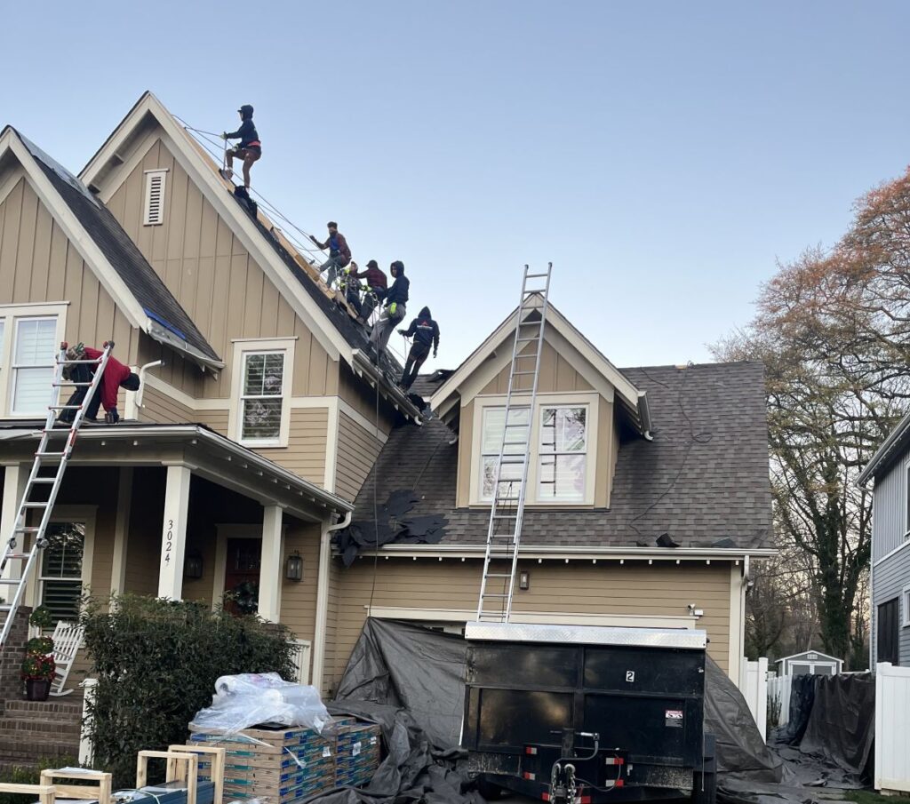 Rock Roofing team working on a roof