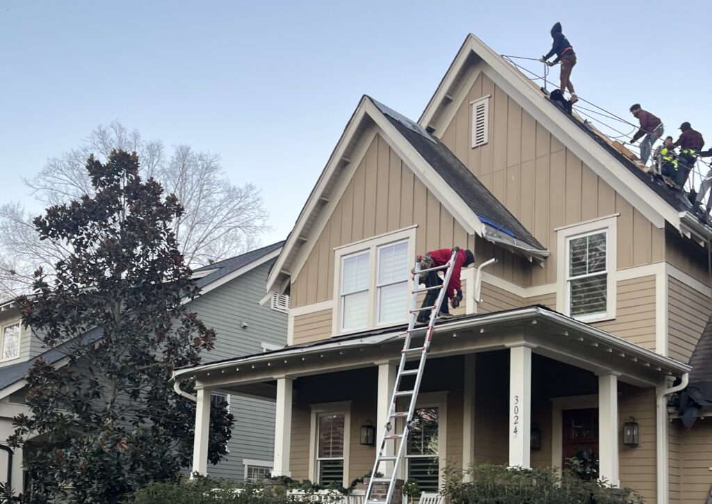 Rock Roofing team on a roof